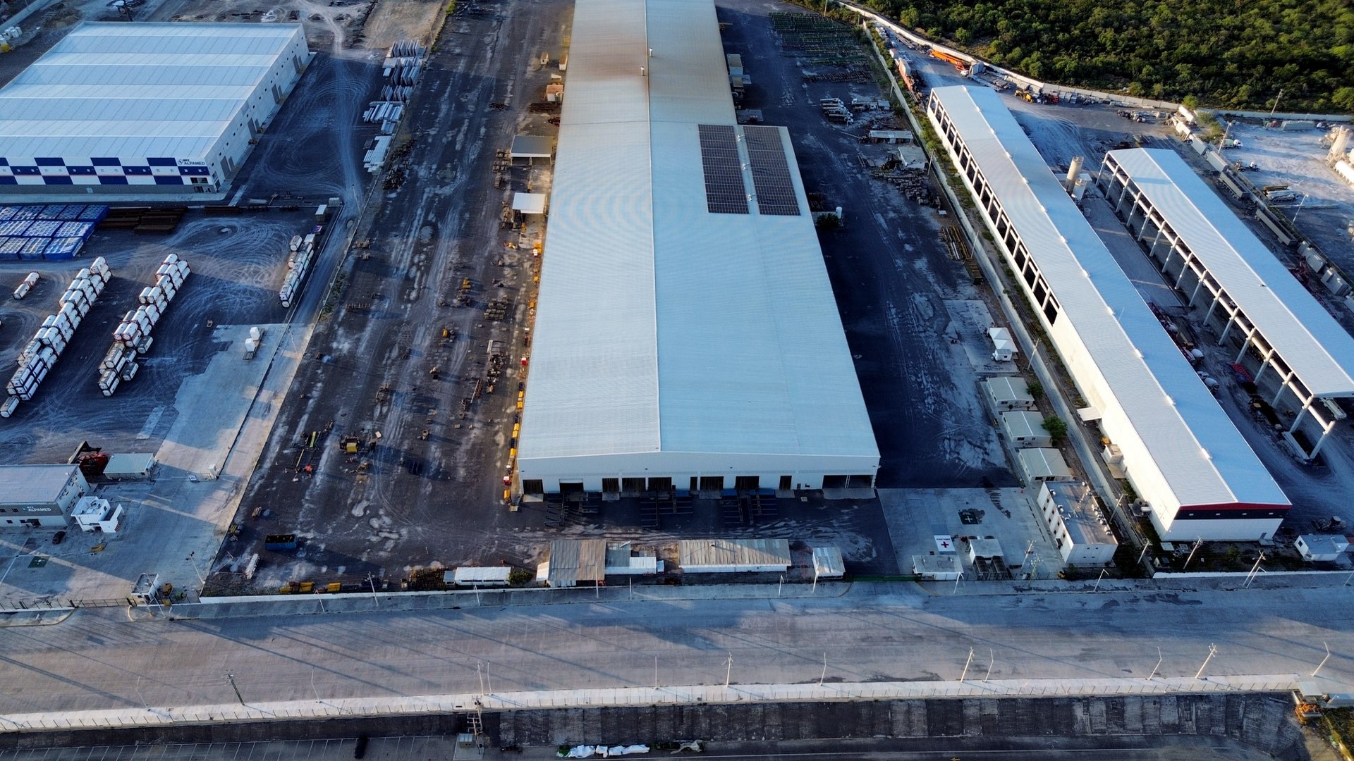 Solar-roof building and tank yard
